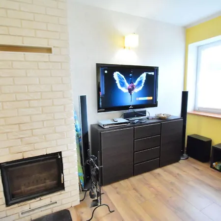 Semesterbostad With A Fireplace In *